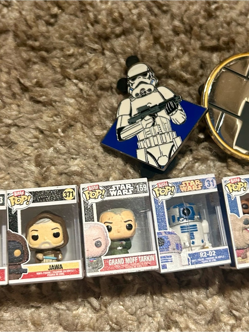 Star Wars mini funko pops and two Disney pins 2025